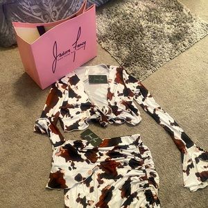 Never worn two piece set. Exclusive from Jadore Fancy boutique in Miami